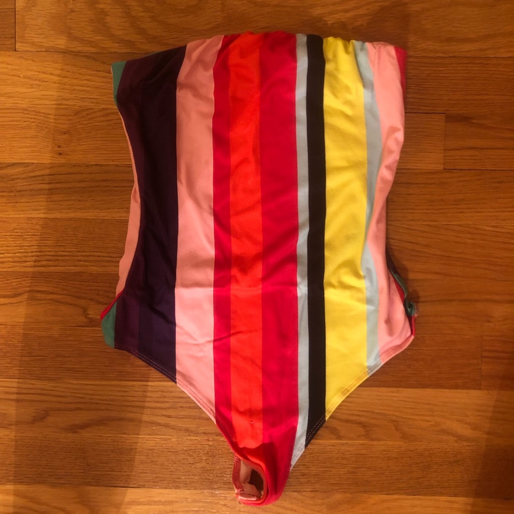 Brand new. Small. Without Tags. Bodysuit